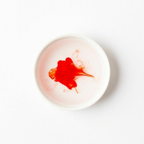 لون سائل برتقالي مختبر